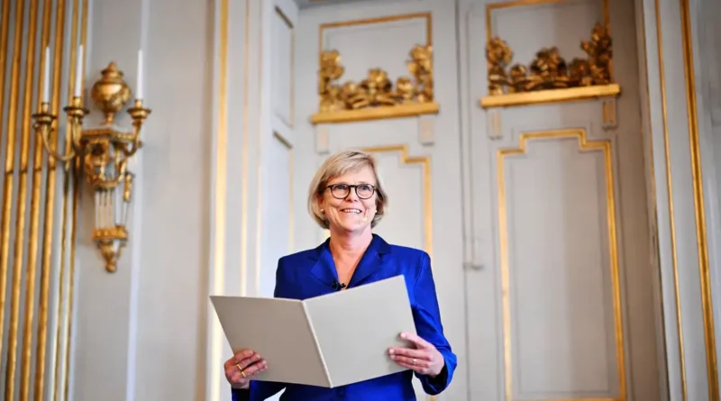 The Permanent Secretary of the Swedish Academy, Ingrid Carlberg, announces that Canadian author Anne Carson is awarded the Nobel Prize in Literature 2026, in Stockholm, Sweden, October 8, 2026. TT News Agency/Christine Olsson via REUTERS ATTENTION EDITORS - THIS IMAGE WAS PROVIDED BY A THIRD PARTY. SWEDEN OUT. NO COMMERCIAL OR EDITORIAL SALES IN SWEDEN.