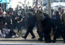 French CRS riot police charge amid clashes with protesters during a demonstration by high school and university students, supported by teachers' union and school parents, in Paris as part of a nationwide day of demonstrations and blockades, voicing anger over overcrowded classrooms, teacher shortages and dilapidated school buildings, which students blame on years of underinvestment, France, October 6, 2026. REUTERS/Yves Herman