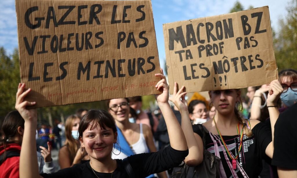 Protesters hold placards during a demonstration by high school and university students supported by teachers, parents' associations, and education labour unions, in Paris as part of a nationwide day of demonstrations and blockades, voicing anger over overcrowded classrooms, teacher shortages and dilapidated school buildings, which students blame on years of underinvestment, France, October 6, 2026. The slogan reads