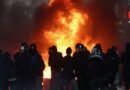 Flames and smoke rise during civil unrest, the day after a national day of demonstrations against the cost of living and rising fuel prices, in Paris, France, October 18, 2026. REUTERS/Abdul Saboor